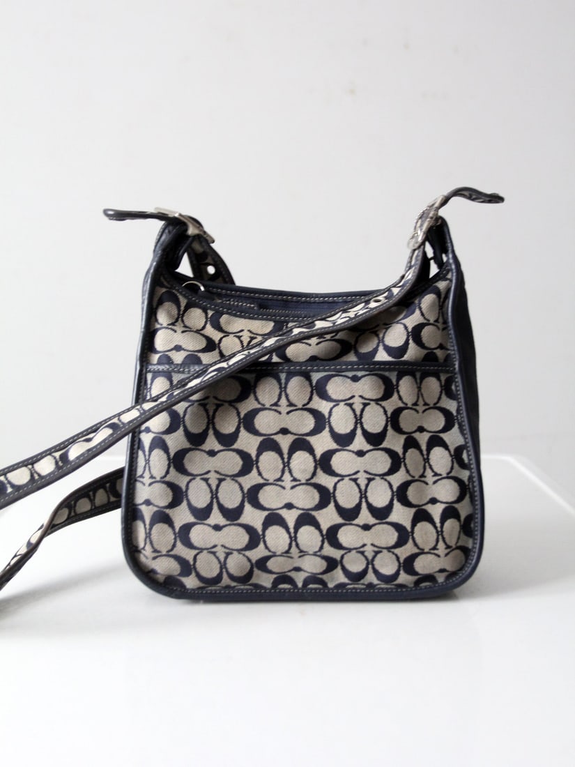 Authentic Vintage Coach C Monogram Crossbody Bag Navy Beige: Authentic Vintage Coach C Monogram Crossbody Bag Navy Beige Elevate your style with this authentic vintage Coach Signature C Monogram Crossbody Bag, a perfect blend of early-2000s charm and modern fun