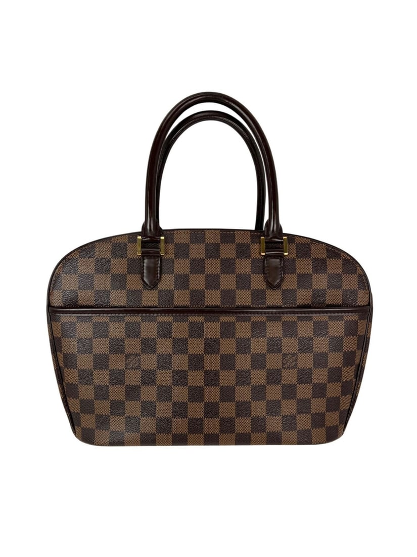Louis Vuitton Sarria Horizontal Damier Ebene Canvas Satchel Handbag: Louis Vuitton Sarria Horizontal Damier Ebene Canvas Satchel Handbag This Louis Vuitton Sarria Horizontal handbag features the iconic Damier Ebene canvas with a trapezoid silhouette and gold-tone brass
