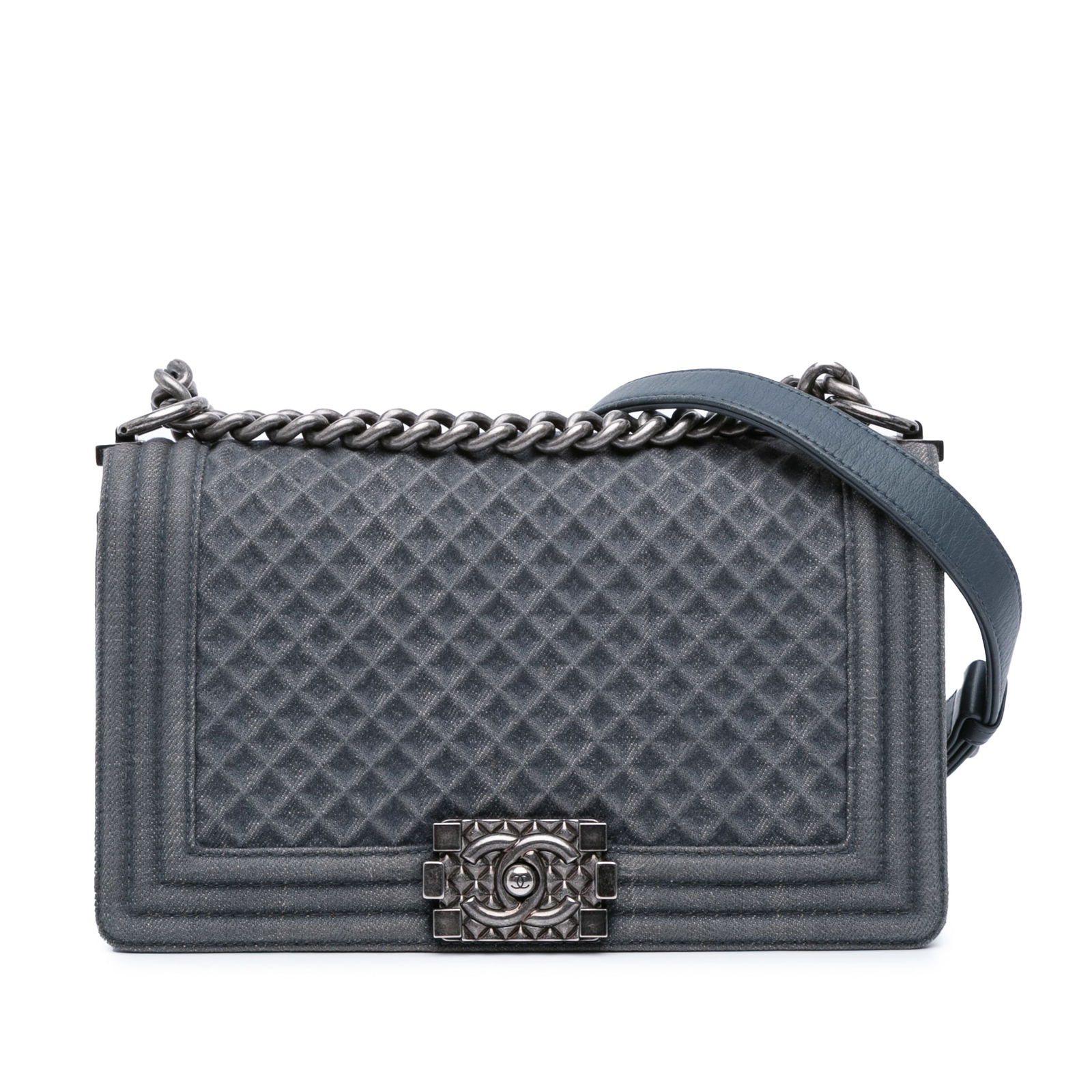 Chanel Medium Blue Embossed Denim Boy Flap Bag: Chanel Medium Blue Embossed Denim Boy Flap Bag This Chanel Medium Embossed Denim Boy Flap bag showcases a stylish embossed denim body, complemented by a curb chain strap featuring an adjustable flat l