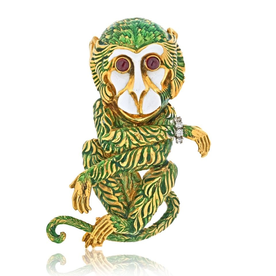 David Webb Platinum 18K Yellow Gold Monkey Brooch with Green Enamel: David Webb Platinum 18K Yellow Gold Monkey Brooch with Green Enamel The David Webb Platinum & 18K Yellow Gold Gypsy Monkey Green Enamel Brooch showcases the playful spirit and artistic flair character