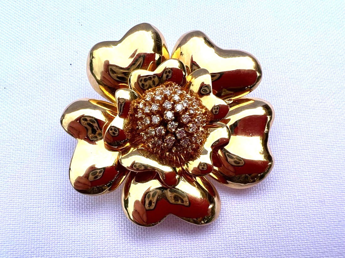 French 18K Yellow Gold Floral Diamond Necklace Brooch: French 18K Yellow Gold Floral Diamond Necklace Brooch This exquisite French brooch doubles as a necklace and is crafted from 18K yellow gold, showcasing a stunning floral design. Weighing 45.60 grams,