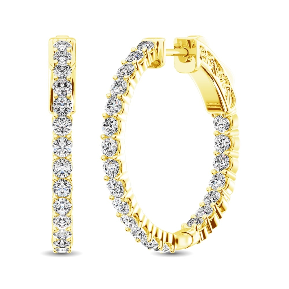 10K Yellow Gold Diamond 2 Ct.Tw. In and Out Hoop Earrings: 10K Yellow Gold Diamond 2 Ct.Tw. In and Out Hoop Earrings These eye-catching earrings are available in 10K Yellow Gold. There are 21 round diamonds with a total carat weight of 2 Ct.Tw. set in a Prong