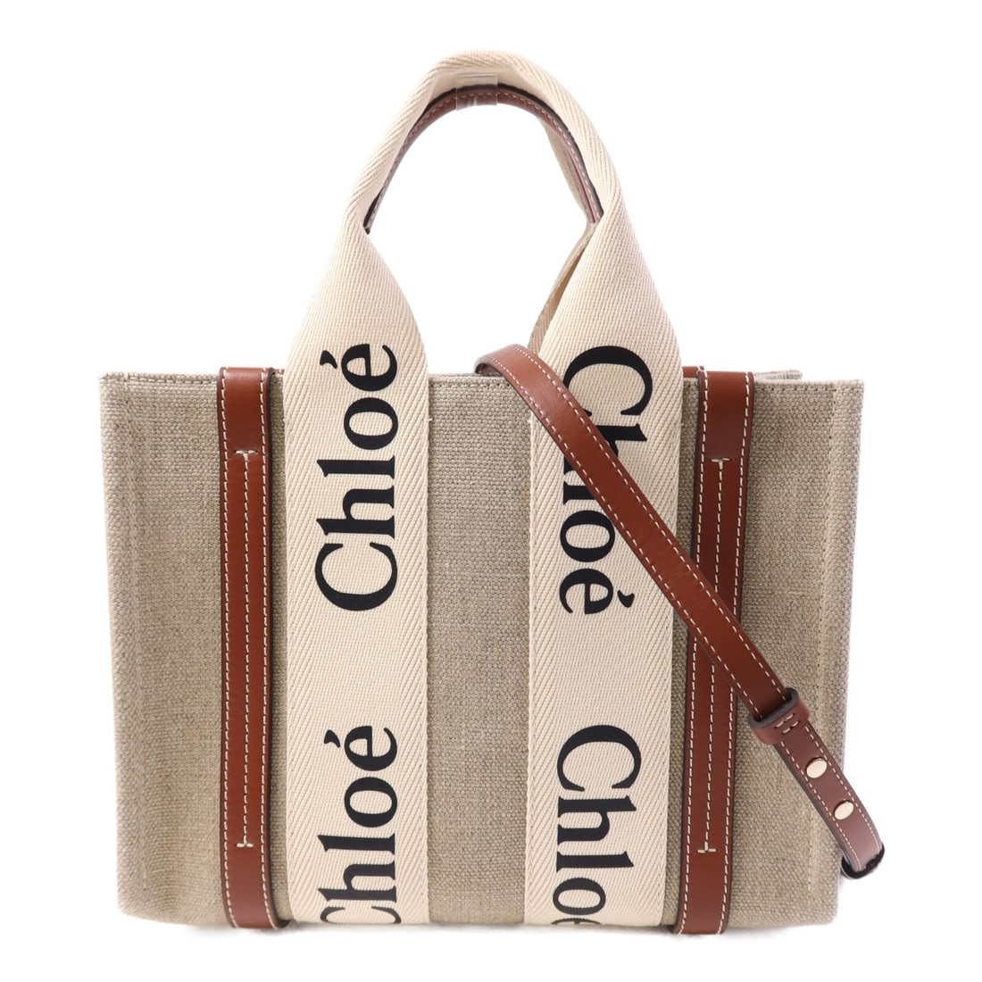 Chloe Woody Small Canvas and Leather Two-Way Shoulder Bag Beige Brown: Chloe Woody Small Canvas and Leather Two-Way Shoulder Bag Beige Brown This Chloe Woody small shoulder bag features a versatile 2-way design crafted from beige and tan canvas with calfskin leather acce