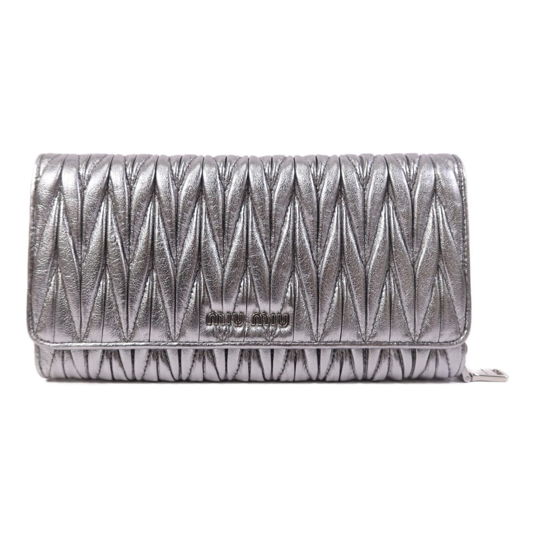 Lambskin Bifold Wallet Silver Tone by Miu Miu: Lambskin Bifold Wallet Silver Tone by Miu Miu This Miu Miu long bifold wallet is crafted from lambskin leather in a striking silver color. Featuring a regular size, it has a sleek design with a matchi