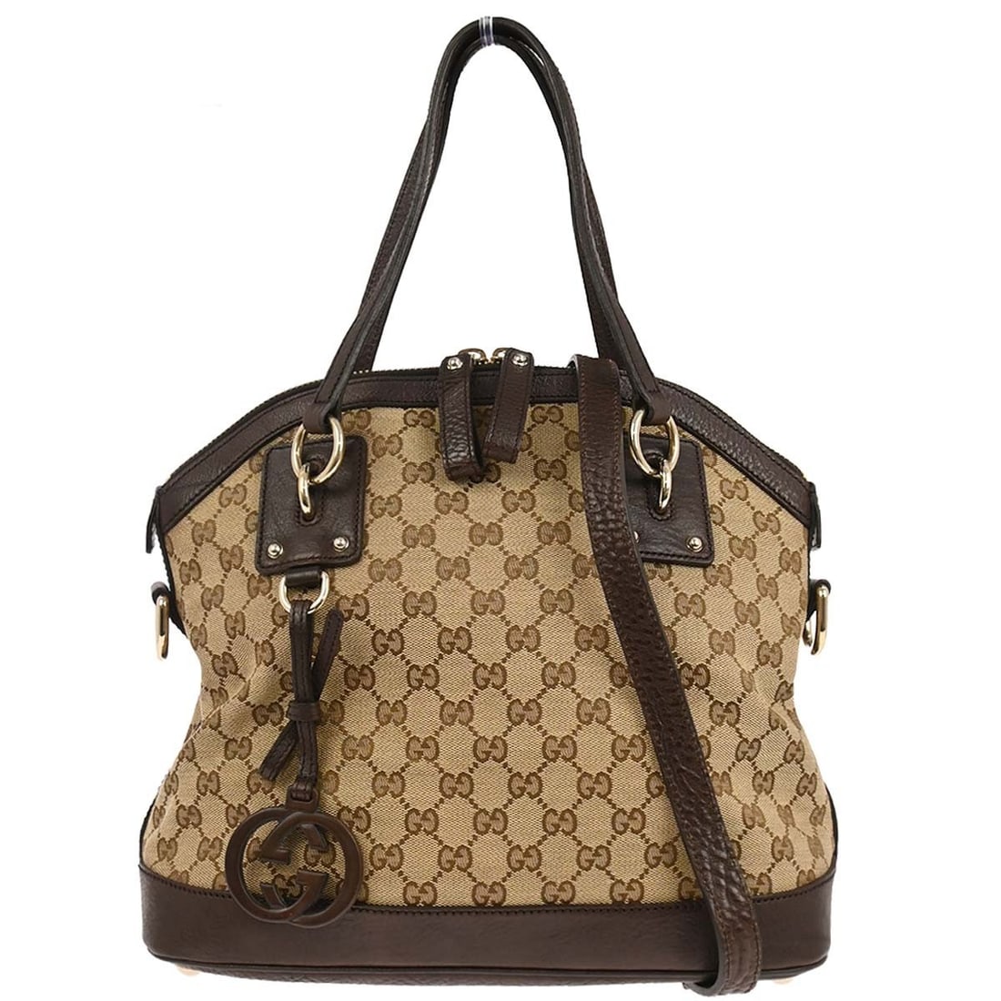 Gucci GG Canvas Beige Medium Tote 2way Handbag 247279 204991: Gucci GG Canvas Beige Medium Tote 2way Handbag 247279 204991 This Gucci beige canvas GG 2-way handbag features a medium-sized tote design with leather accents. The bag offers both style and functional