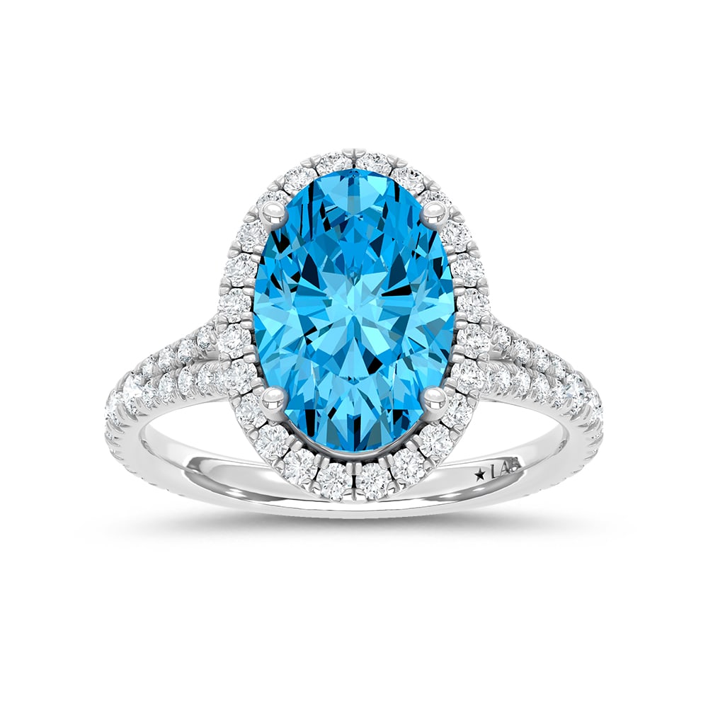 14K White Gold Lab Grown Diamond 3 5/8 Ct.Tw. Blue Oval Engagement Ring (Center 3ct): 14K White Gold Lab Grown Diamond 3 5/8 Ct.Tw. Blue Oval Engagement Ring (Center 3ct) Celebrate elegance with this 14K White Gold Engagement Ring, featuring a captivating 3-carat lab-grown blue ovan-cu