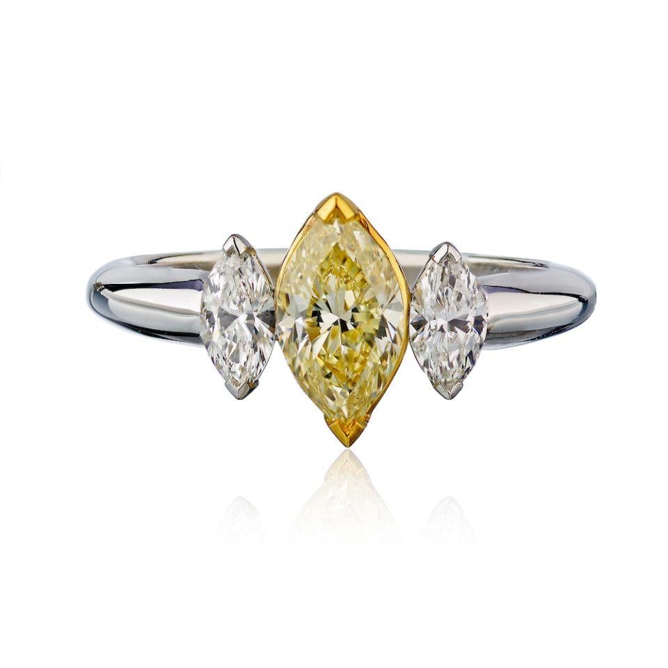 14K White Gold Fancy Yellow Three Stone Diamond Engagement Ring: 14K White Gold Fancy Yellow Three Stone Diamond Engagement Ring This exquisite estate ring features a stunning design crafted from 14K white gold. It showcases a prominent fancy yellow marquise cut di
