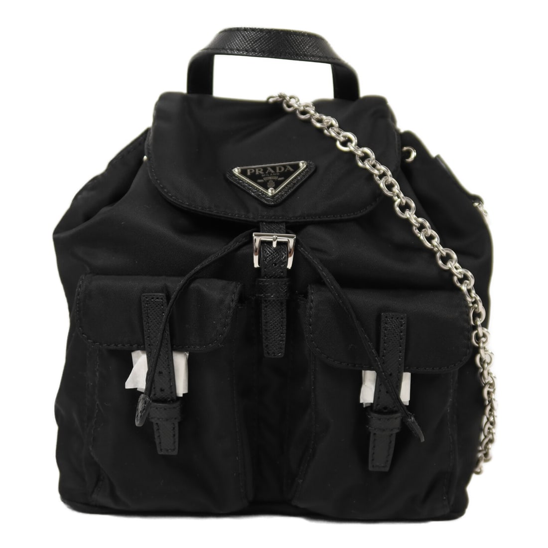 Prada Mini Black Nylon 2-Way Chain Shoulder Backpack 1BH029 Silver Hardware: Prada Mini Black Nylon 2-Way Chain Shoulder Backpack 1BH029 Silver Hardware This PRADA mini backpack is crafted from black nylon and features a 2-way design that can be styled as a shoulder bag or wor