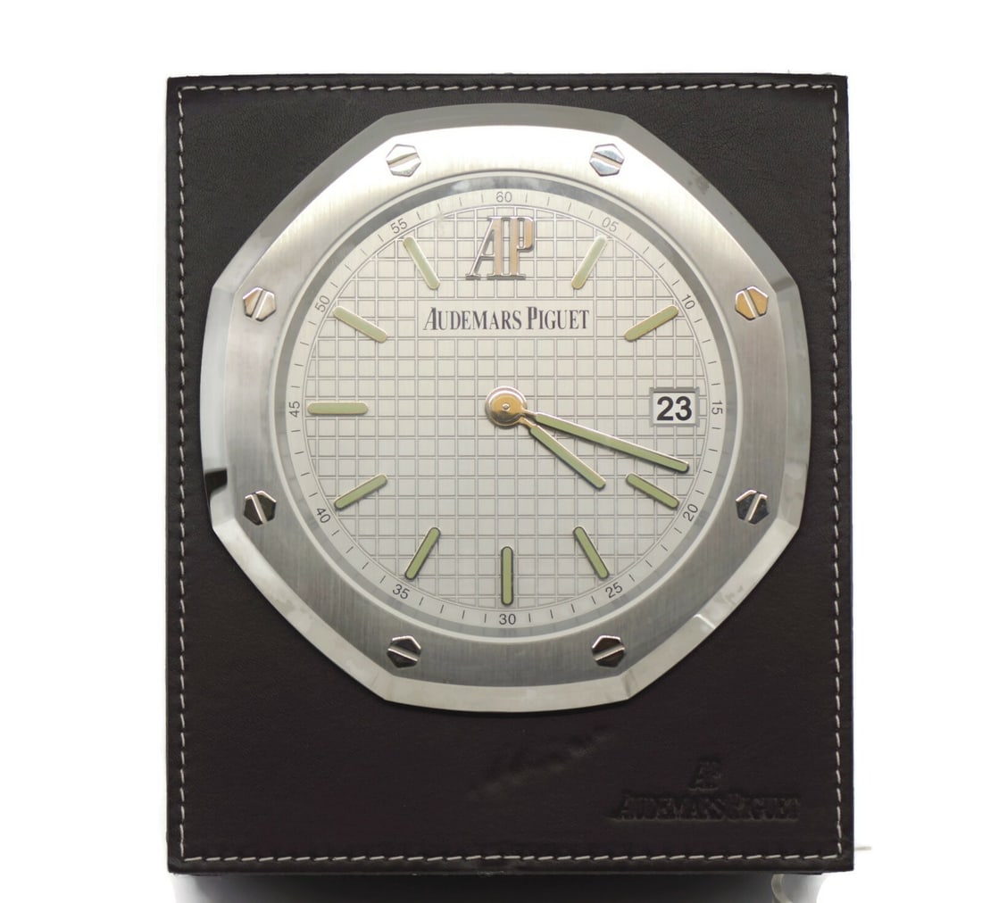 Audemars Piguet Royal Oak Authentic Desk Clock 5x6 Inches: Audemars Piguet Royal Oak Authentic Desk Clock 5x6 Inches This Audemars Piguet Royal Oak Table Clock is a stunning desk clock that combines elegance with functionality. Measuring 5 x 6 inches, it show