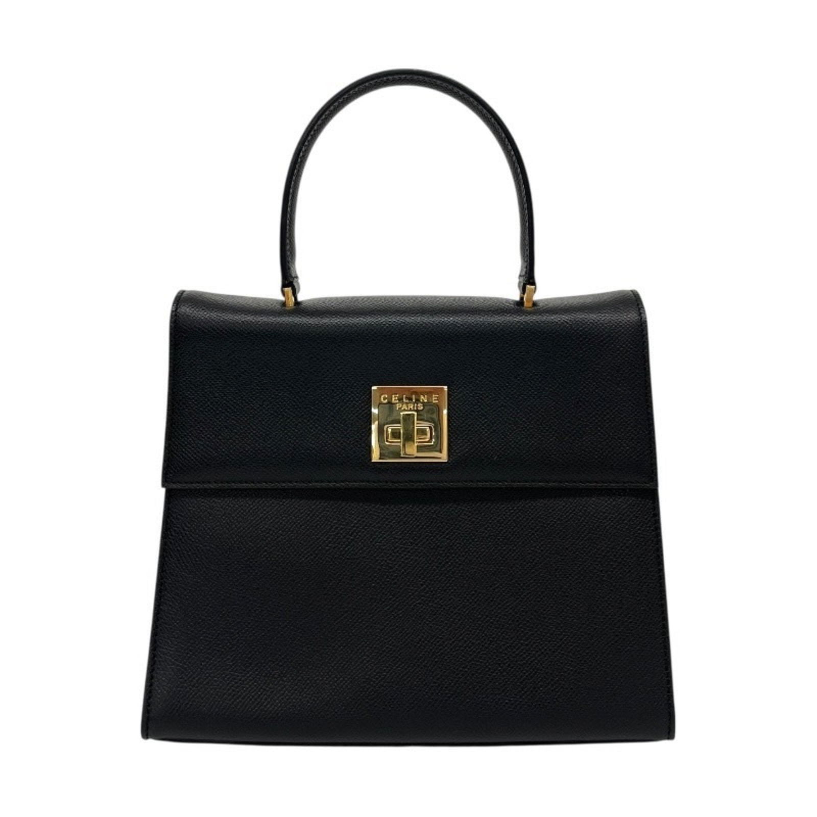 Black Leather Shoulder Bag by Celine for Women: Black Leather Shoulder Bag by Celine for Women This Celine handbag for women features a sleek black leather exterior, crafted in Italy. The bag shows minor signs of use with some small scratches on th