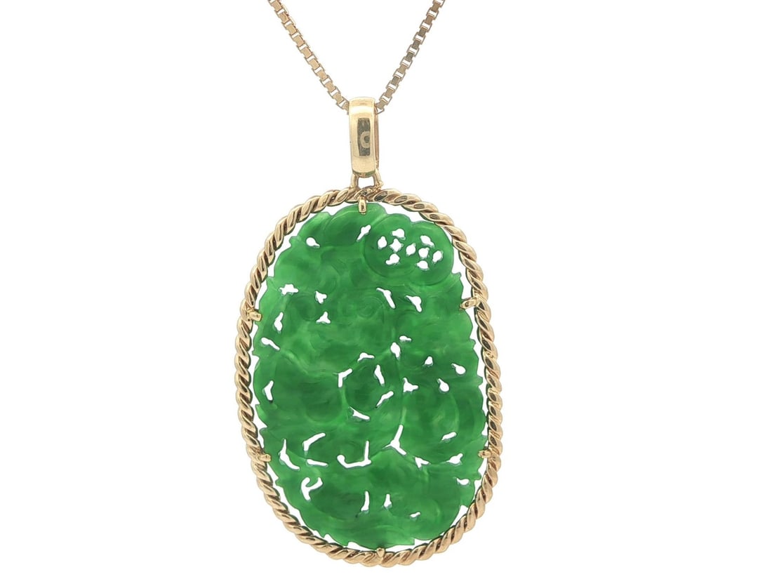 Handmade 18k Yellow Gold Necklace With Carved Jade Floral Pendant 27 Inch: Handmade 18k Yellow Gold Necklace With Carved Jade Floral Pendant 27 Inch This vintage pendant necklace features a custom-cut, natural green jade stone intricately carved with a floral openwork design