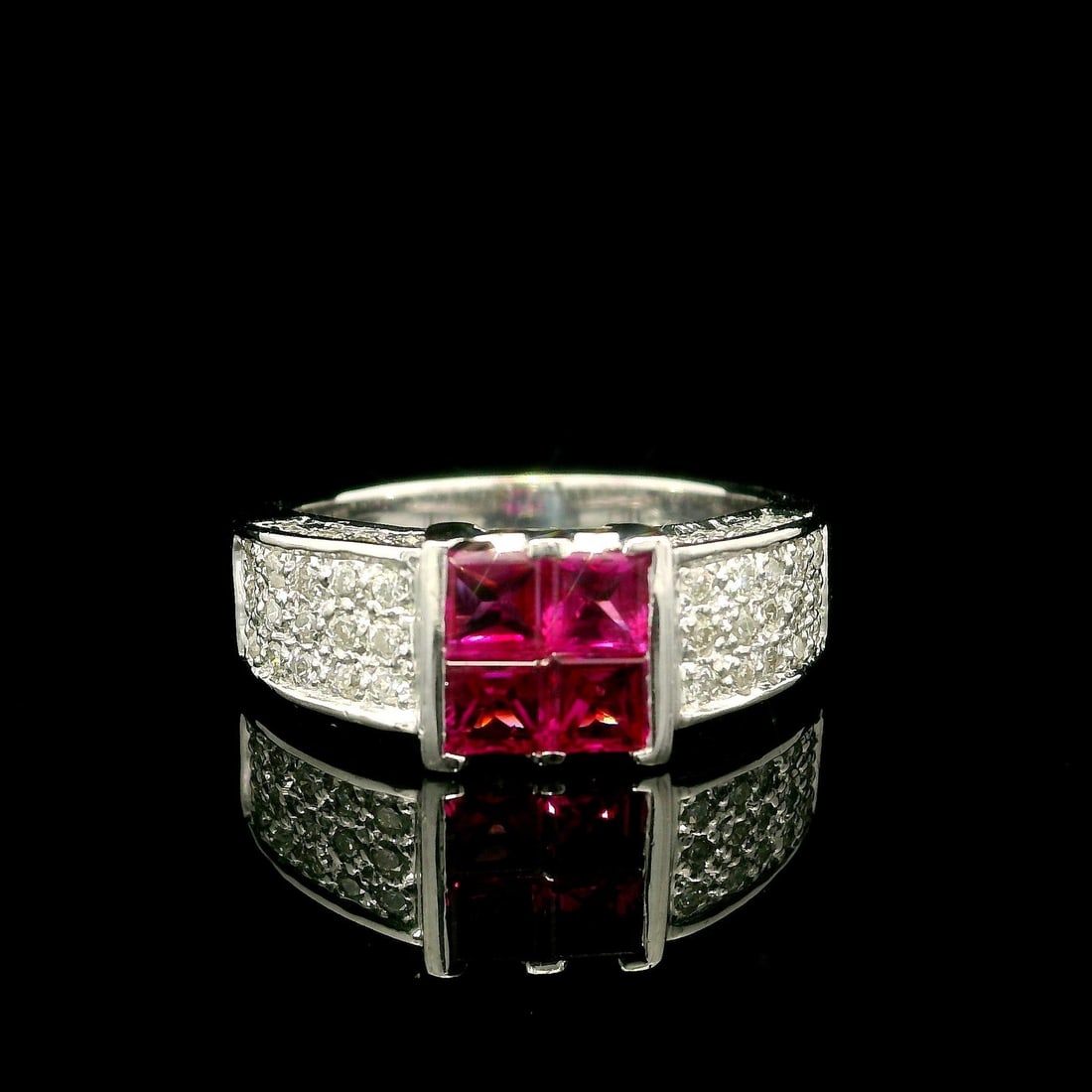 18k White Gold Square Ruby Diamond Cocktail Ring 1.57ctw: 18k White Gold Square Ruby Diamond Cocktail Ring 1.57ctw This stunning cocktail ring features a captivating design with four natural genuine rubies in a square cut, set in an illusion channel to creat