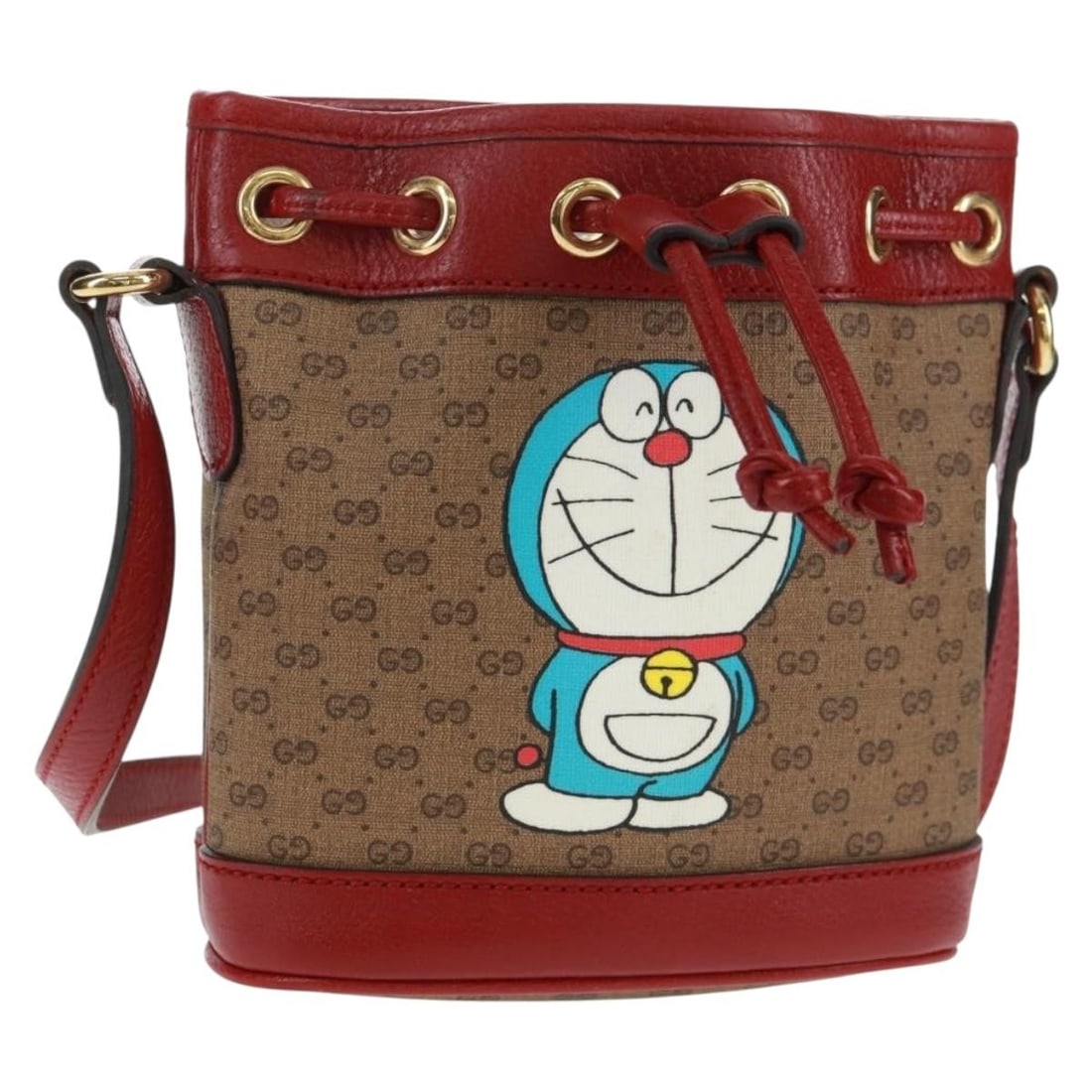 Doraemon Collaboration Micro GG Supreme Beige PVC Shoulder Bag by Gucci: Doraemon Collaboration Micro GG Supreme Beige PVC Shoulder Bag by Gucci This GUCCI Micro GG Supreme Doraemon collaboration shoulder bag features a beige and gold color scheme with PVC leather and micr