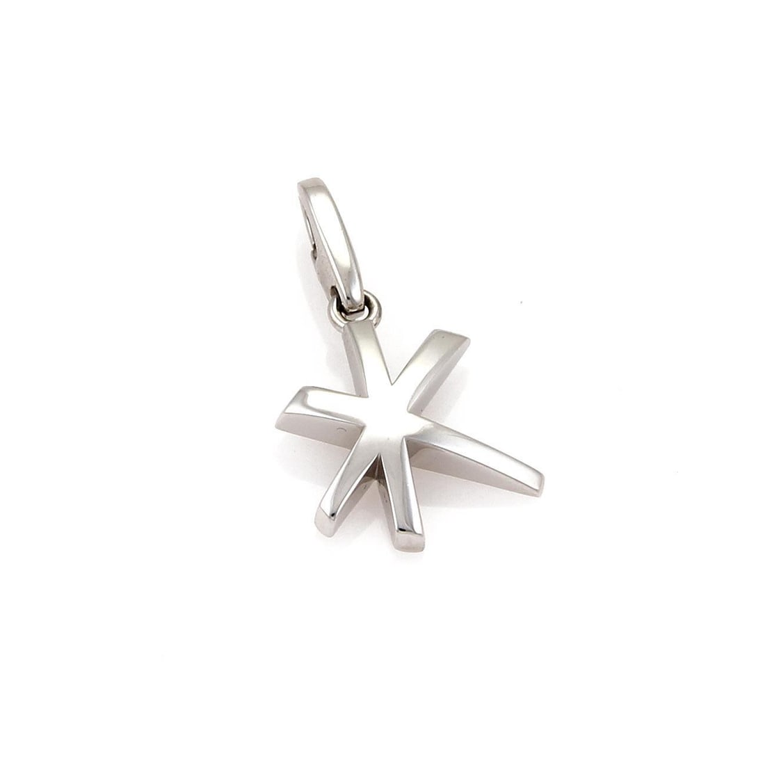 Cartier 18k White Gold Shooting Star Charm Pendant with Certificate: Cartier 18k White Gold Shooting Star Charm Pendant with Certificate Elevate your accessory collection with this exquisite charm pendant from Cartier. Crafted from 18k white gold, this pendant showcase