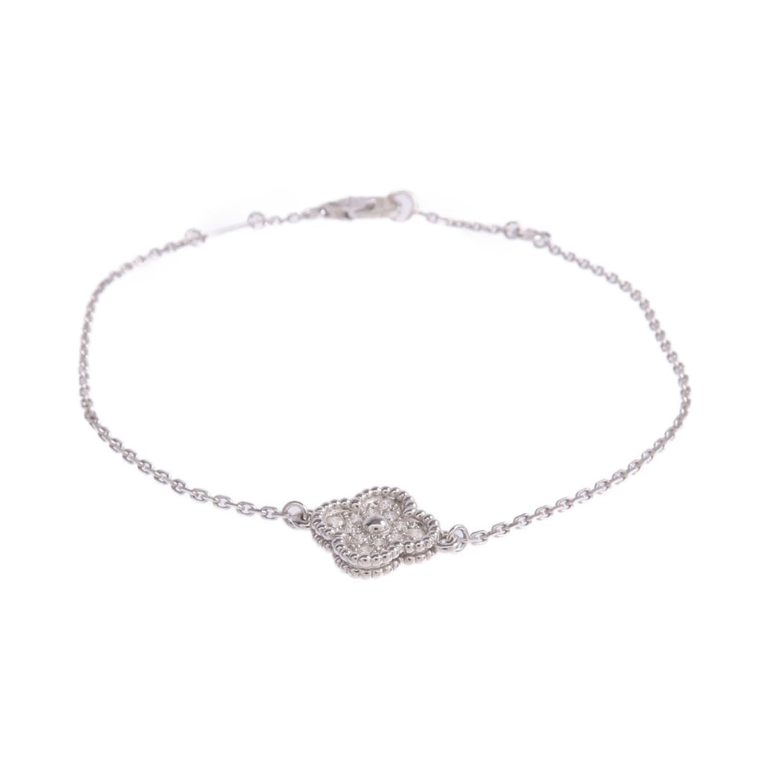 Sweet Alhambra Diamond Bracelet in 18K White Gold by Van Cleef & Arpels: Sweet Alhambra Diamond Bracelet in 18K White Gold by Van Cleef & Arpels This Van Cleef & Arpels Sweet Alhambra bracelet features diamonds set in 18K white gold. Crafted in France, the bracelet showcas