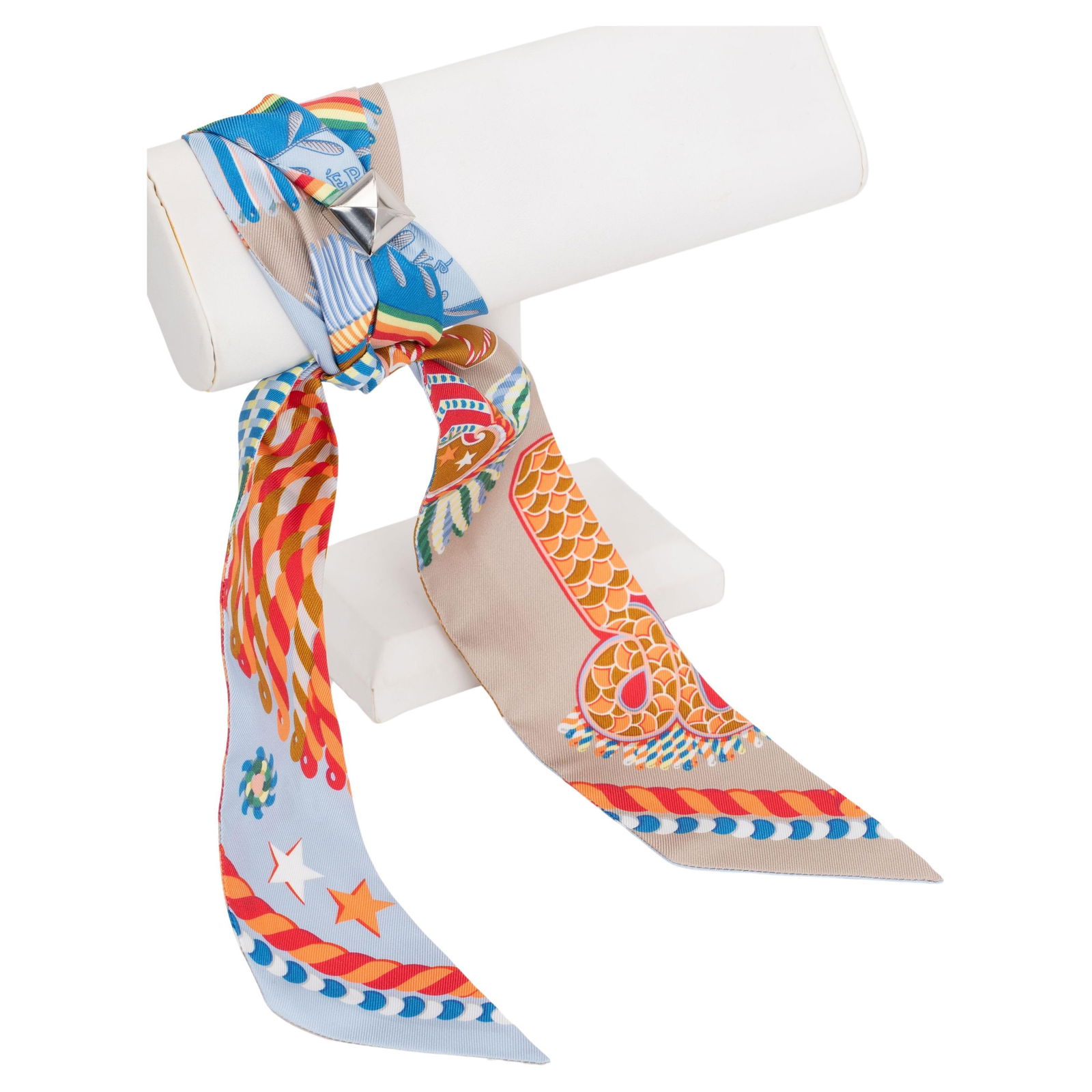 Hermes Epaulettes De Gala Twilly 100% Silk with Palladium Medor Slide: Hermes Epaulettes De Gala Twilly 100% Silk with Palladium Medor Slide This exquisite Hermes "Epaulettes De Gala" Twilly is crafted from 100% silk, showcasing vibrant colors of Blue Ciel, Rouge, and Ja