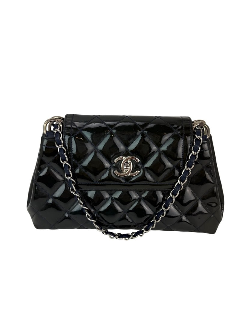 Chanel Coco Shine Medium Dark Navy Patent Leather Flap Bag: Chanel Coco Shine Medium Dark Navy Patent Leather Flap Bag Elevate your style with this Chanel Medium Coco Shine Accordion Flap Bag, crafted in luxurious dark navy patent leather. This exquisite bag f