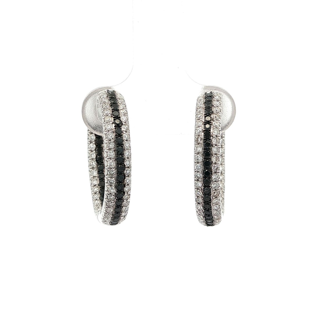 18k White Gold 1.08ct Fancy Black and White Diamond Hoop Earrings: 18k White Gold 1.08ct Fancy Black and White Diamond Hoop Earrings Elevate your style with these stunning 18k white gold hoop earrings, featuring a captivating blend of fancy black and white diamonds.