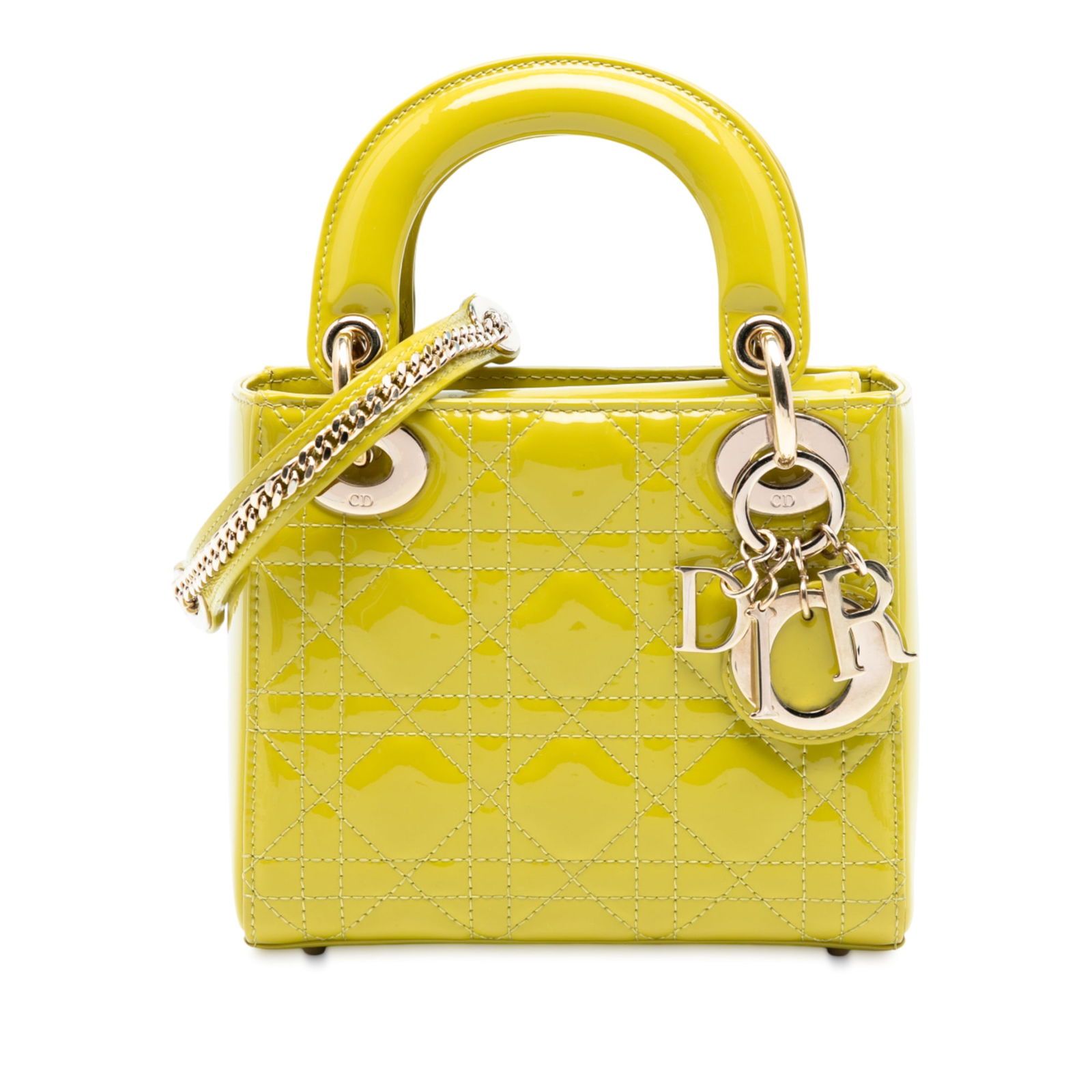 Dior Mini Patent Cannage Lady Dior Yellow Leather Bag: Dior Mini Patent Cannage Lady Dior Yellow Leather Bag The Mini Patent Cannage Lady Dior bag showcases a luxurious quilted patent leather construction in a vibrant yellow hue. This exquisite handbag fe