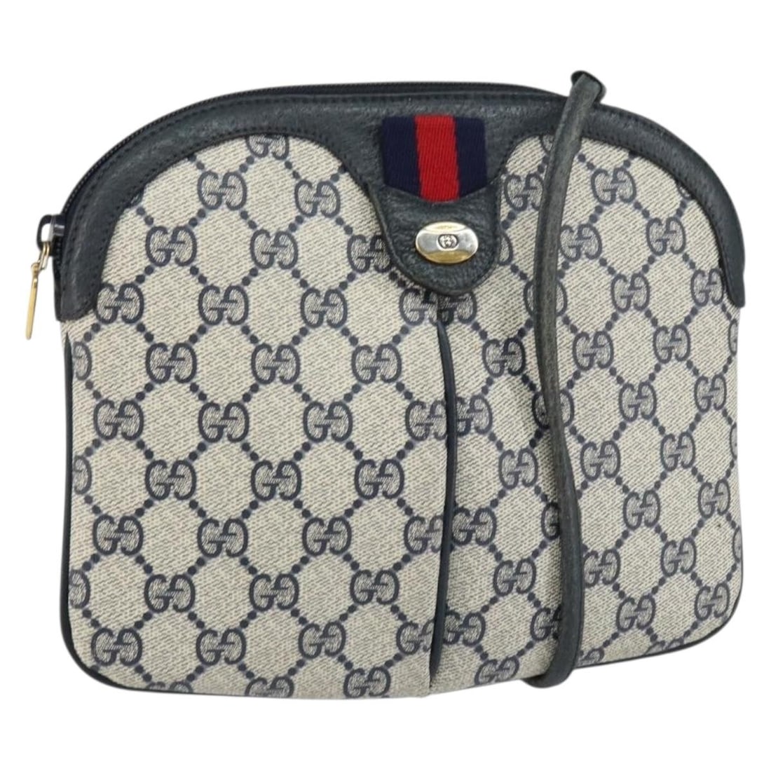 Navy GG Supreme Sherry Line Shoulder Bag by Gucci 904 02 047: Navy GG Supreme Sherry Line Shoulder Bag by Gucci 904 02 047 This Gucci GG Supreme Sherry Line shoulder bag features a navy and gold color scheme with signature GG canvas and PVC leather exterior. Mad