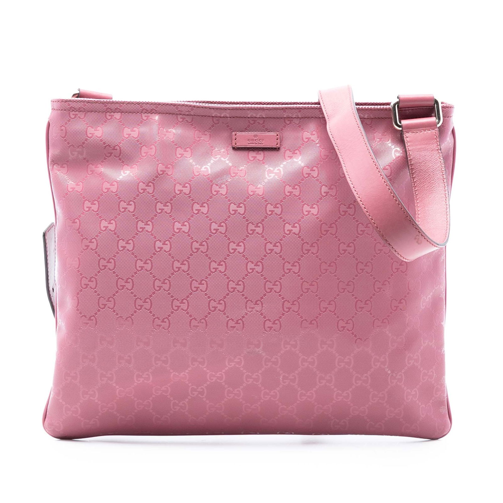 Pink GG Imprime crossbody bag with adjustable leather strap by Gucci: Pink GG Imprime crossbody bag with adjustable leather strap by Gucci This Gucci GG Imprime Crossbody bag features a coated canvas exterior in pink, complemented by an adjustable flat leather strap. Th