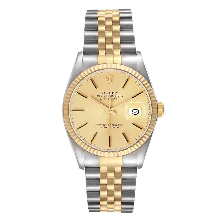Datejust Ref 16013 Champagne Stick Dial Jubilee Bracelet with Papers 1989: Datejust Ref 16013 Champagne Stick Dial Jubilee Bracelet with Papers 1989 This Rolex Datejust Ref 16013 features a champagne stick dial and a fluted bezel, complemented by a Jubilee bracelet. Manufact