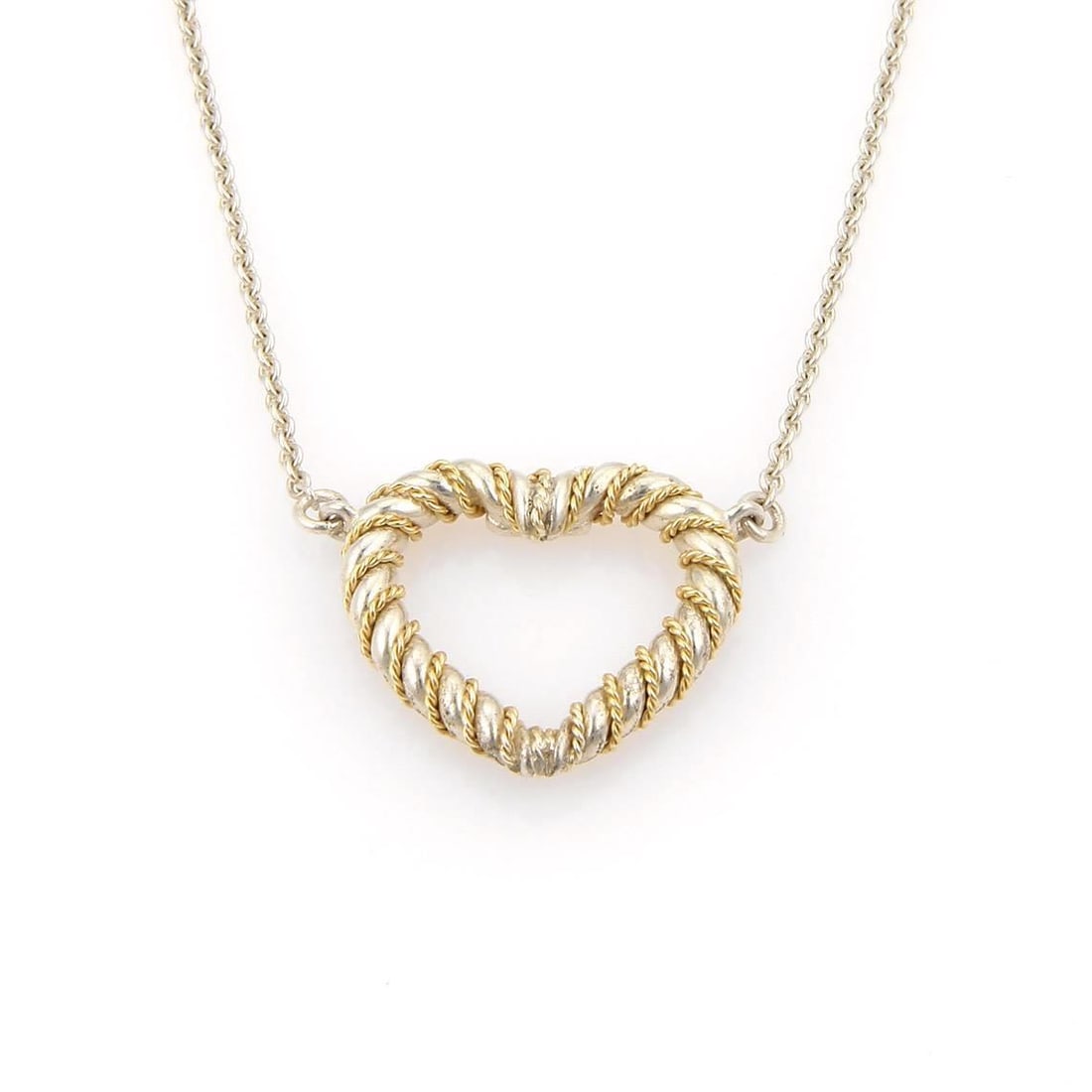 Tiffany & Co. Heart Pendant Necklace Sterling Silver 18k Yellow Gold: Tiffany & Co. Heart Pendant Necklace Sterling Silver 18k Yellow Gold This exquisite necklace from Tiffany & Co. showcases a stunning heart pendant crafted from sterling silver and adorned with 18k yel