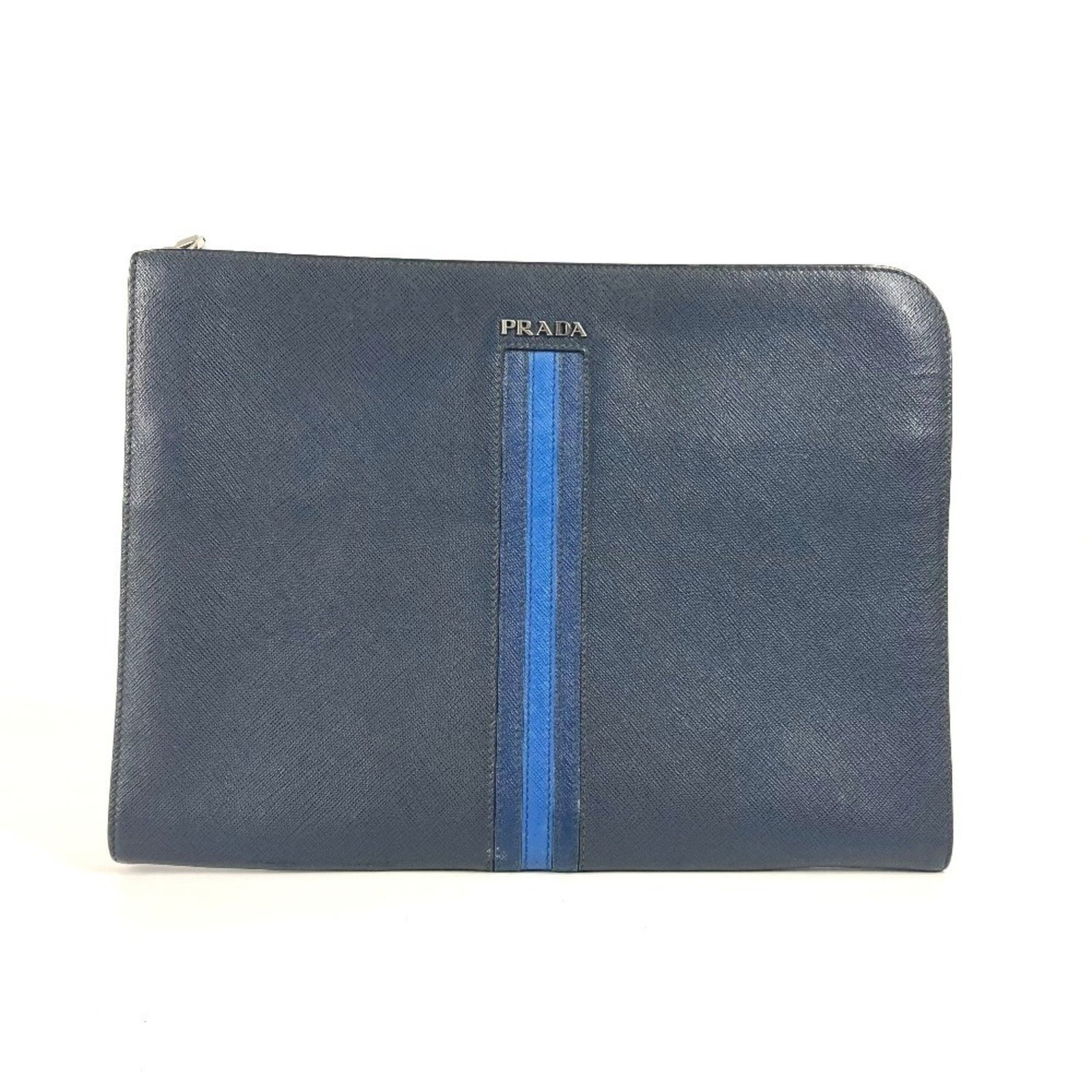 Prada Saffiano Navy Leather Bag 24cm x 33cm Made in Italy: Prada Saffiano Navy Leather Bag 24cm x 33cm Made in Italy This Prada Saffiano model is crafted from navy leather and features a sleek, unisex design. The bag is made in Italy and is in good condition,
