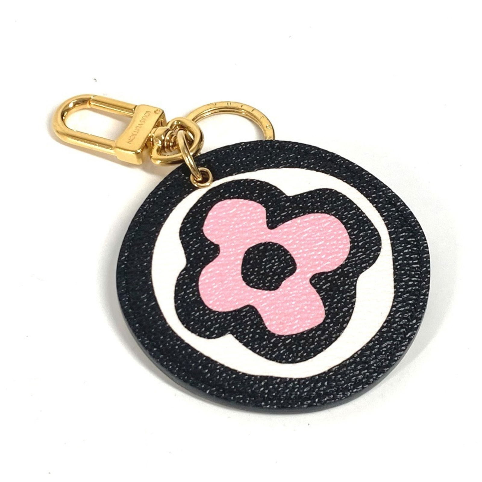 Black Leather Porte Cles Key Holder by Louis Vuitton: Black Leather Porte Cles Key Holder by Louis Vuitton This Louis Vuitton Porte cles key holder features a sleek black leather design, crafted for women. Made in France, it is in good condition with som