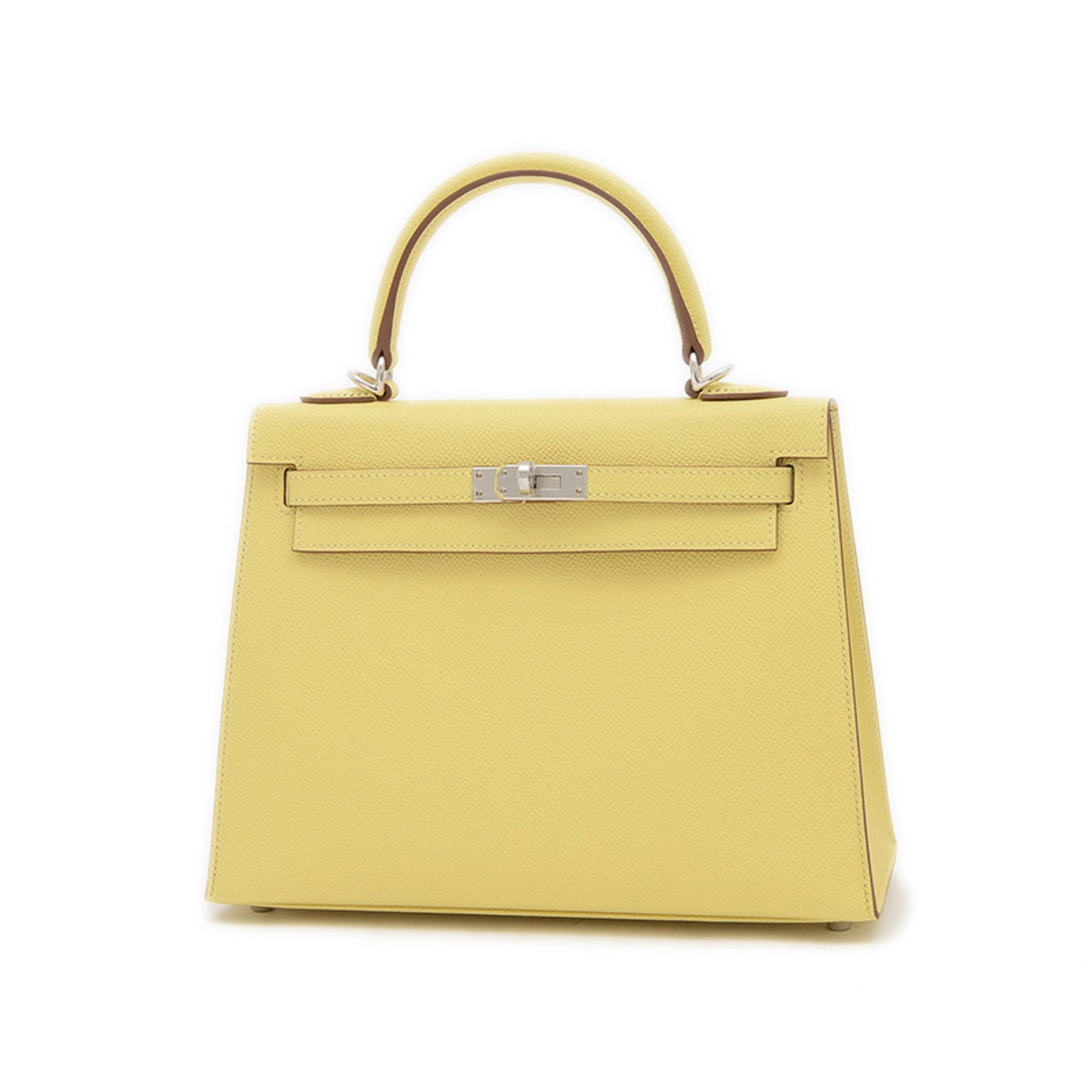 Leather Hermes Kelly 25 Yellow Handbag: Leather Hermes Kelly 25 Yellow Handbag This Hermes Kelly 25 handbag is crafted from yellow leather and designed for women. It features a structured silhouette with a top handle and metal fittings. The