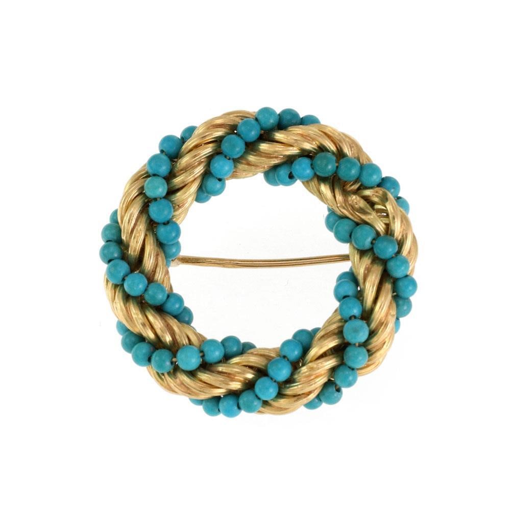 Vintage 18k Yellow Gold Twisted Wreath Brooch with Turquoise Beads: Vintage 18k Yellow Gold Twisted Wreath Brooch with Turquoise Beads This exquisite vintage brooch features a wreath design crafted from 18k yellow gold. Adorned with a delicate string of 2mm turquoise