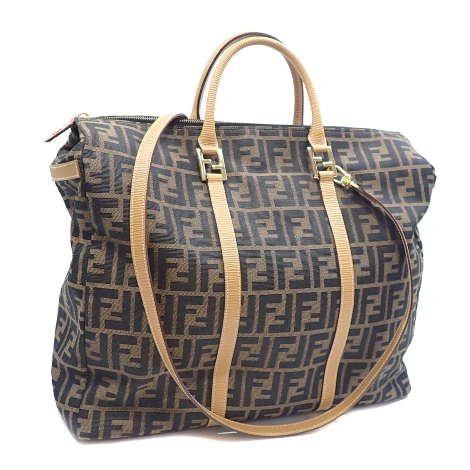 Brown Canvas Women's Handbag from Fendi Italy: Brown Canvas Women's Handbag from Fendi Italy This Fendi bag features a brown canvas exterior with a spacious design, making it a stylish and practical accessory. The bag is crafted in Italy and is su