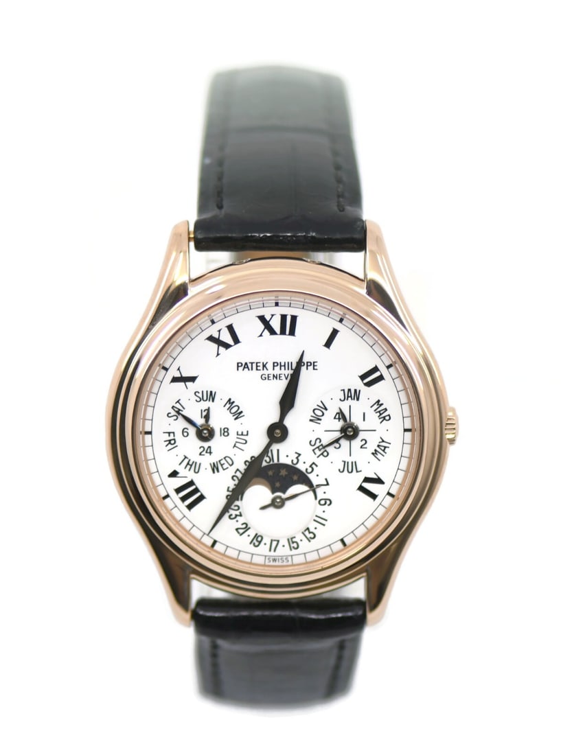 Patek Philippe Grand Complication 18K Rose Gold Watch Ref 3940R with Box and Papers: Patek Philippe Grand Complication 18K Rose Gold Watch Ref 3940R with Box and Papers This exquisite Patek Philippe Grand Complication wristwatch is crafted from 18K rose gold, showcasing a timeless des