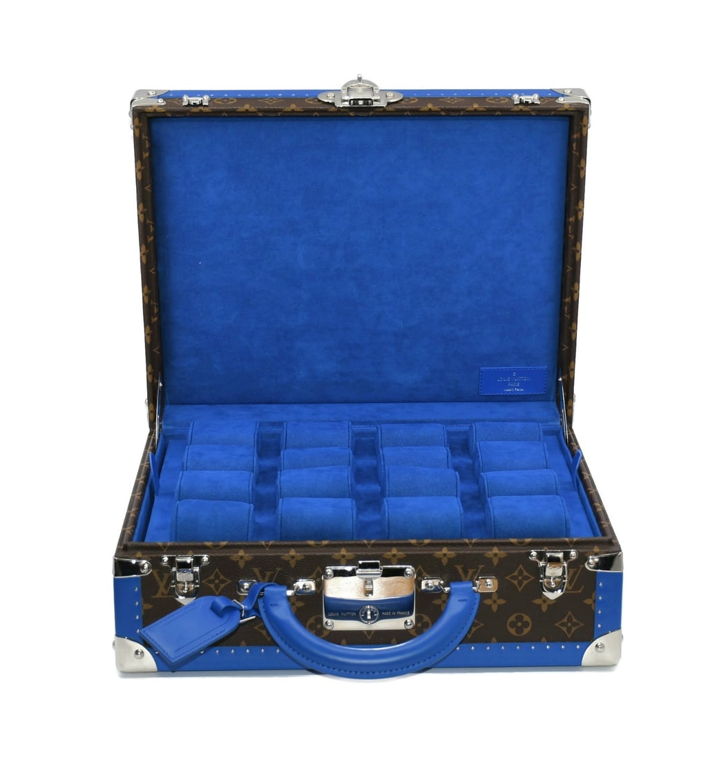 Luxury Watch Storage Trunk for Sixteen Timepieces by Louis Vuitton: Luxury Watch Storage Trunk for Sixteen Timepieces by Louis Vuitton This Louis Vuitton travel trunk case is designed for storing and transporting up to 16 watches. Featuring a luxury theme, it offers s