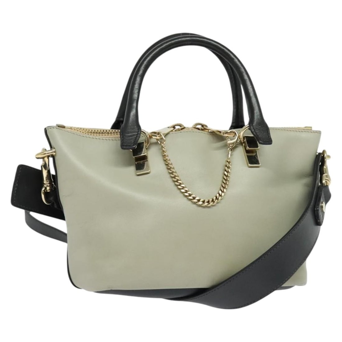 Chloe Bailey Leather Handbag Navy Beige Gold Authentic BA5146: Chloe Bailey Leather Handbag Navy Beige Gold Authentic BA5146 This elegant Chloe Bailey handbag is crafted from high-quality leather, showcasing a stylish combination of navy, beige, and gold tones. T