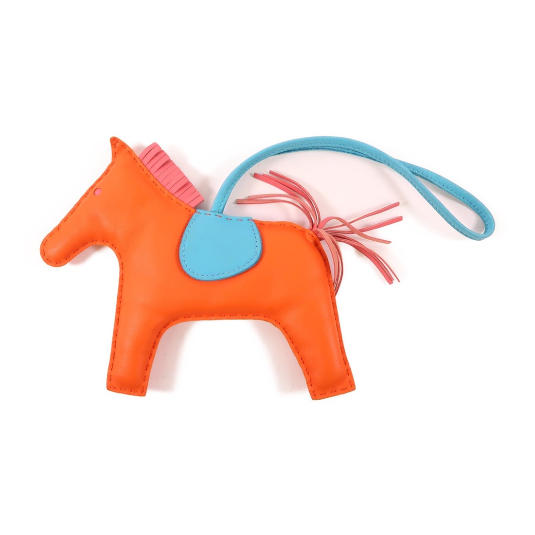 HERMES Rodeo GM Charm Orange Lambskin Leather: HERMES Rodeo GM Charm Orange Lambskin Leather This luxurious HERMES Rodeo GM Charm is crafted from high-quality lambskin leather, featuring a vibrant orange color that adds a touch of elegance to any