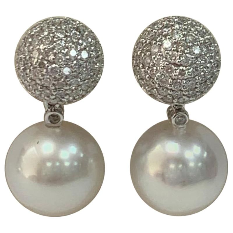 Stunning 18k White Gold South Sea Pearl Diamond Earrings 2.30 Carats: Stunning 18k White Gold South Sea Pearl Diamond Earrings 2.30 Carats Elevate your elegance with these exquisite earrings featuring stunning South Sea pearls and sparkling diamonds. Crafted from 18k wh