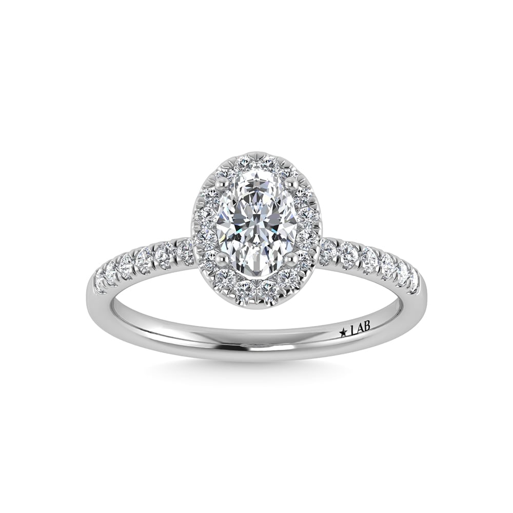14K White Gold Lab Grown Diamond 1 Ct.Tw. Shank Oval Shape Halo Engagement Ring: 14K White Gold Lab Grown Diamond 1 Ct.Tw. Shank Oval Shape Halo Engagement Ring Celebrate your forever moment with the timeless brilliance of our Halo Diamond Engagement Ring. This exquisite piece fea