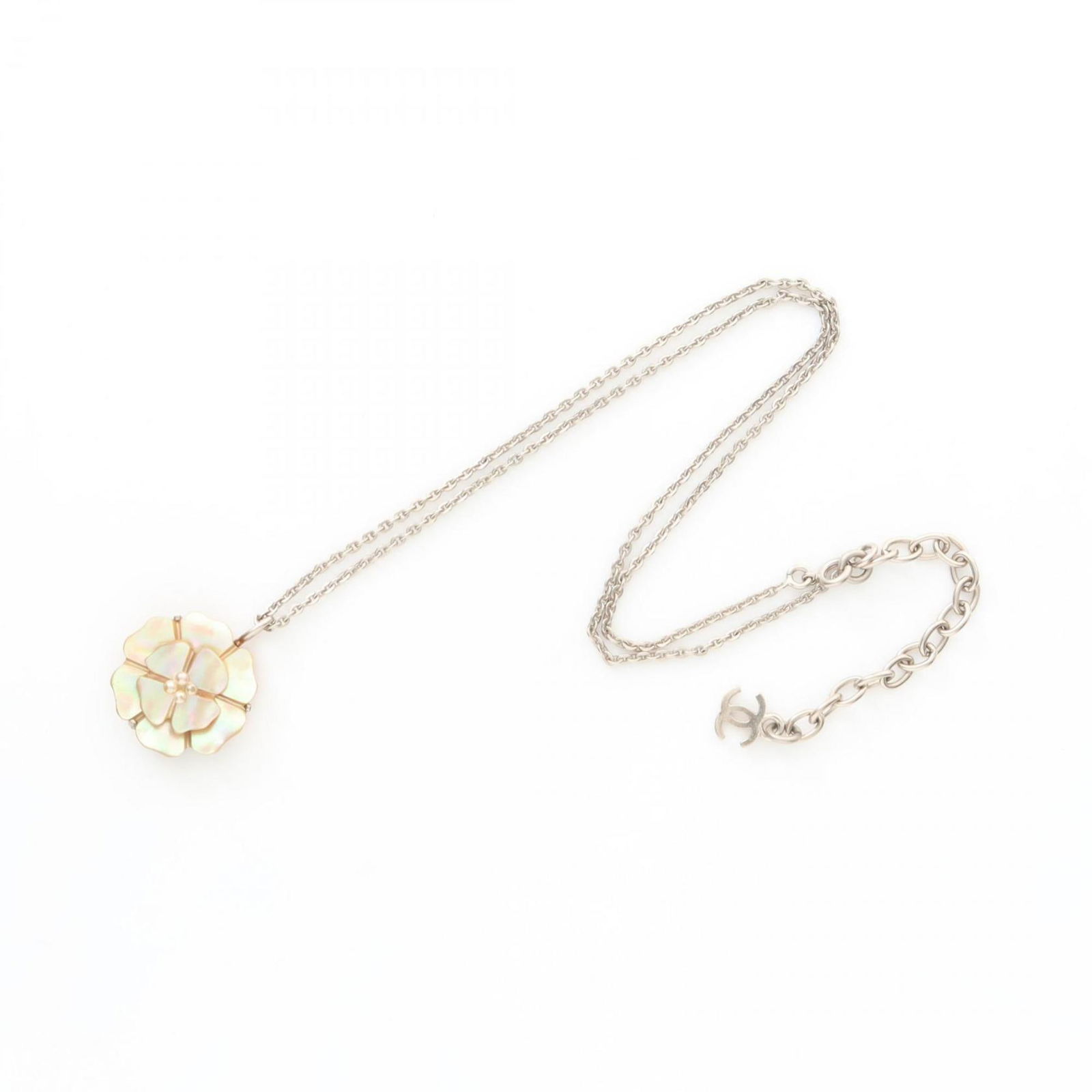 Pink Steel Camellia Necklace by Chanel: Pink Steel Camellia Necklace by Chanel This Chanel Camellia necklace features a pink steel pendant in the shape of the iconic Camellia, designed for women. Crafted in France, it has a neck circumferen