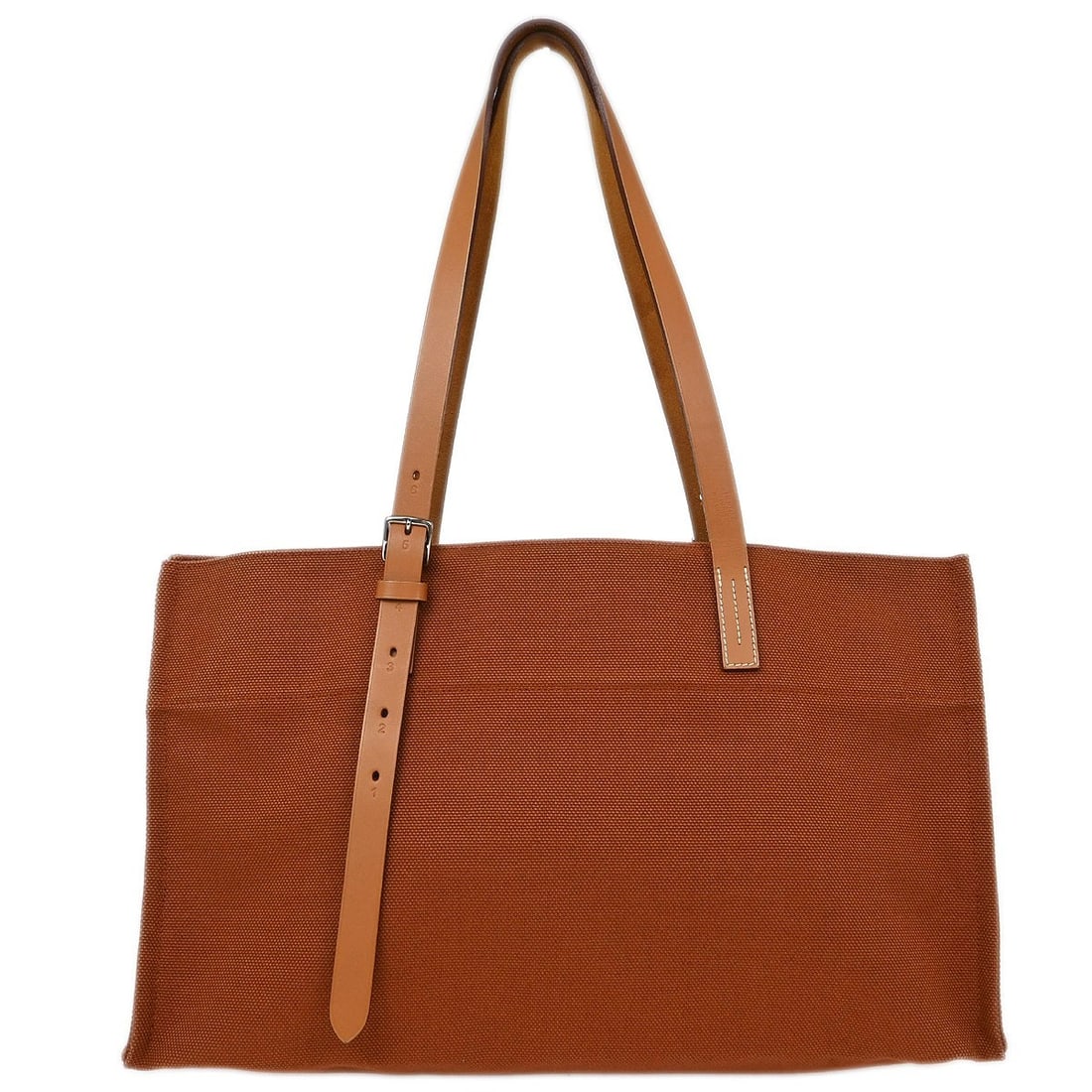 Hermes Etriviere Elan Brown Canvas Tote Bag: Hermes Etriviere Elan Brown Canvas Tote Bag This elegant Hermes Etriviere Elan Tote Bag is crafted from premium brown canvas leather, making it a stylish choice for casual outings. With a large size,