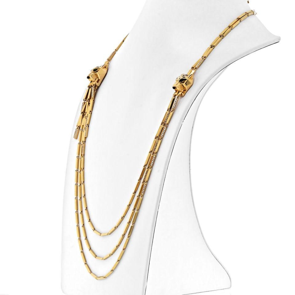 Cartier 18K Yellow Gold Double Panthere Tassel Necklace with Certificate: Cartier 18K Yellow Gold Double Panthere Tassel Necklace with Certificate This stunning vintage Cartier necklace showcases the elegance of 18K yellow gold in a luxurious design. The Double Panthere Tas
