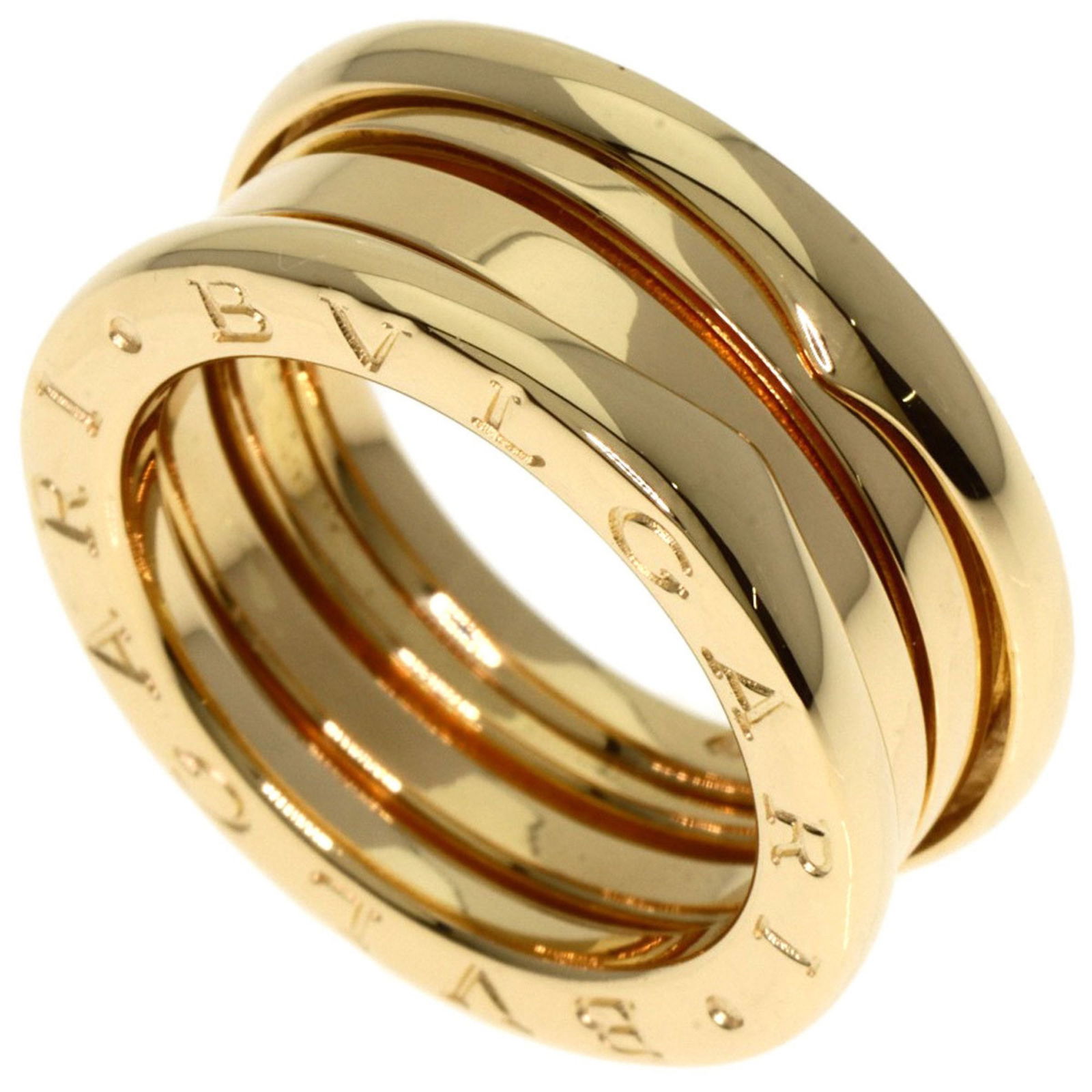 B.Zero1 yellow gold ring by Bulgari size 5: B.Zero1 yellow gold ring by Bulgari size 5 This Bulgari B.Zero1 ring features a unisex design crafted from yellow gold. The ring is in good condition with minor traces of use and slight scratches. It