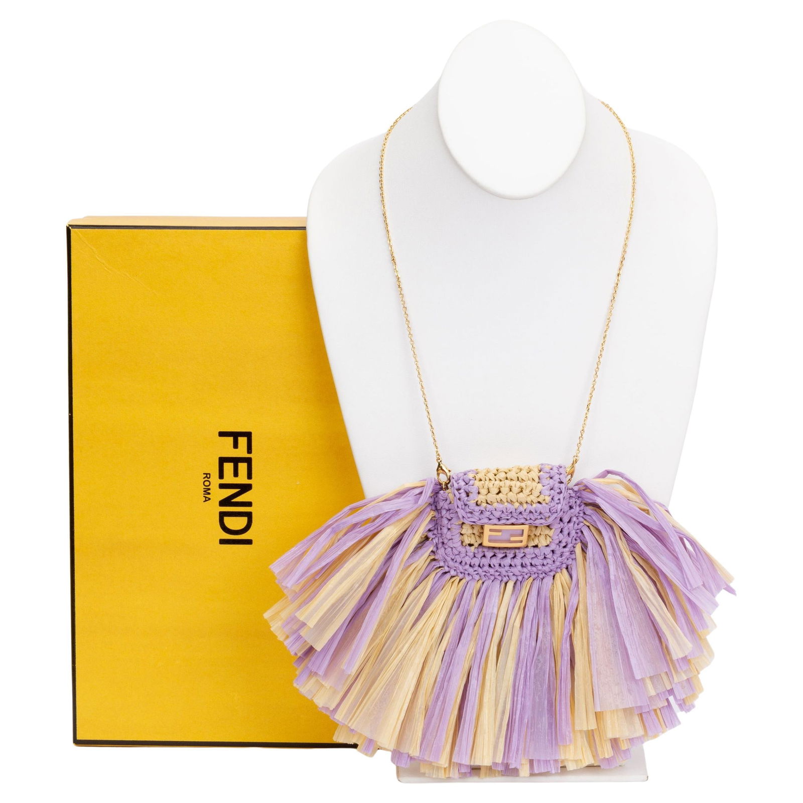 Fendi Micro Baguette Tassel Necklace New in Box Italy: Fendi Micro Baguette Tassel Necklace New in Box Italy Introducing the Fendi Micro Baguette Tassel Necklace, a stunning piece of designer jewelry that embodies luxury and creativity. This exquisite nec