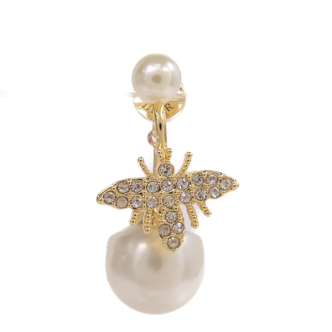 Dior CD Tribales Gold Tone and White Single Pierced Earring: Dior CD Tribales Gold Tone and White Single Pierced Earring This Christian Dior CD Tribales single earring features a modern design crafted from metal and PVC in gold and white tones. Designed for pie