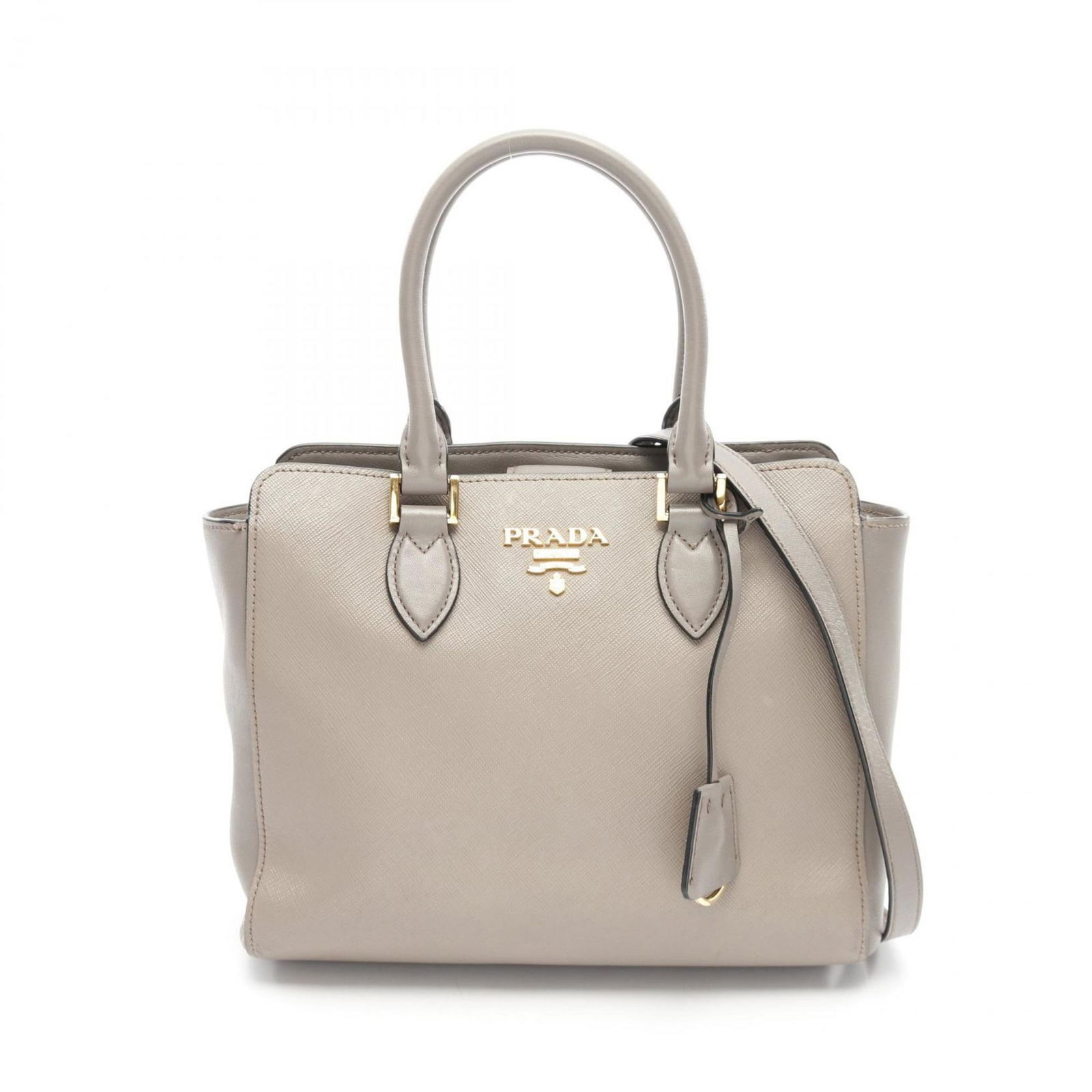 Grey Leather Prada Saffiano Handbag from Italy: Grey Leather Prada Saffiano Handbag from Italy This Prada Saffiano handbag is crafted from grey leather and features a structured design. The bag is designed for women and includes subtle Prada brandi