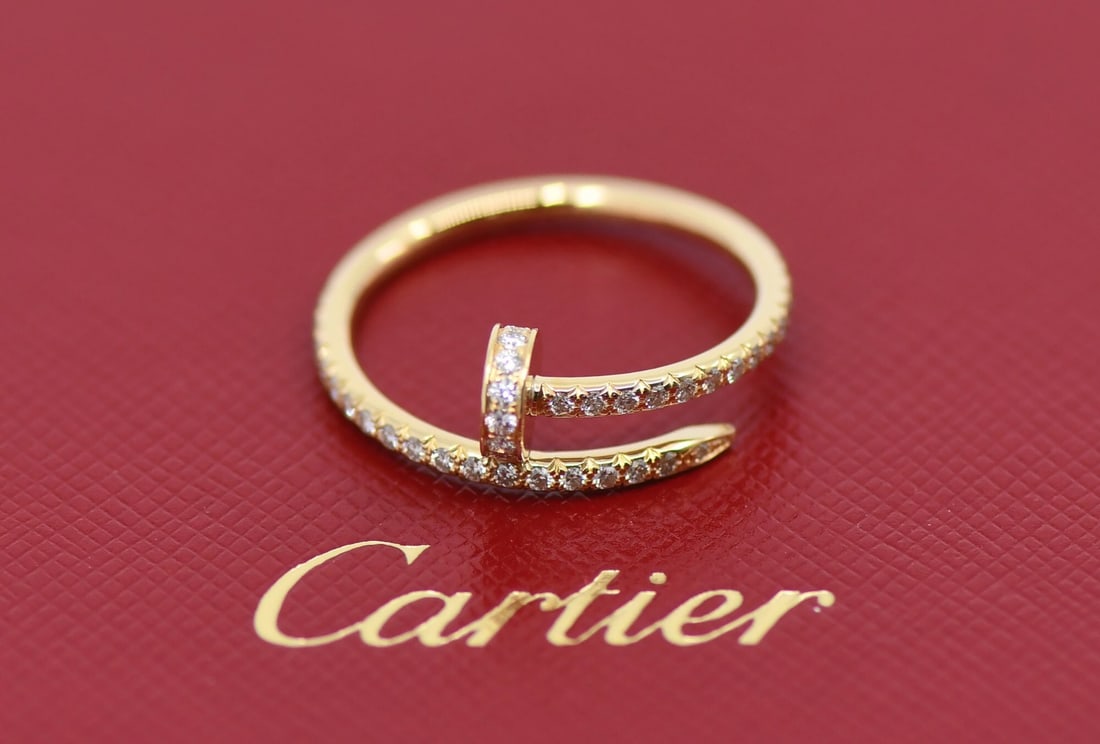 Juste un Clou Small Model Diamond Ring 18K Yellow Gold Size 54 by Cartier: Juste un Clou Small Model Diamond Ring 18K Yellow Gold Size 54 by Cartier This Cartier Juste un Clou Small Model ring is crafted in 18K yellow gold and features diamond accents. The ring is a size 54