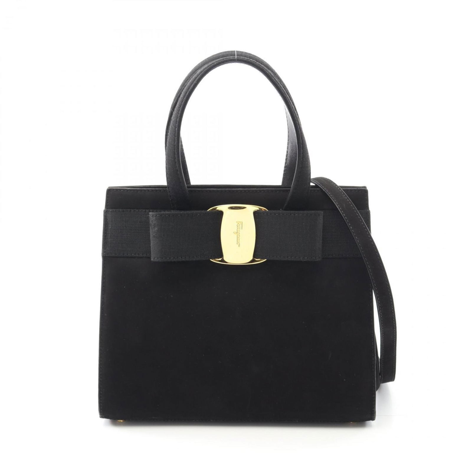 Black Suede Vara Handbag by Salvatore Ferragamo Italy: Black Suede Vara Handbag by Salvatore Ferragamo Italy This Salvatore Ferragamo Vara handbag for women is crafted from black suede and features a classic design. Made in Italy, the bag offers a spaciou