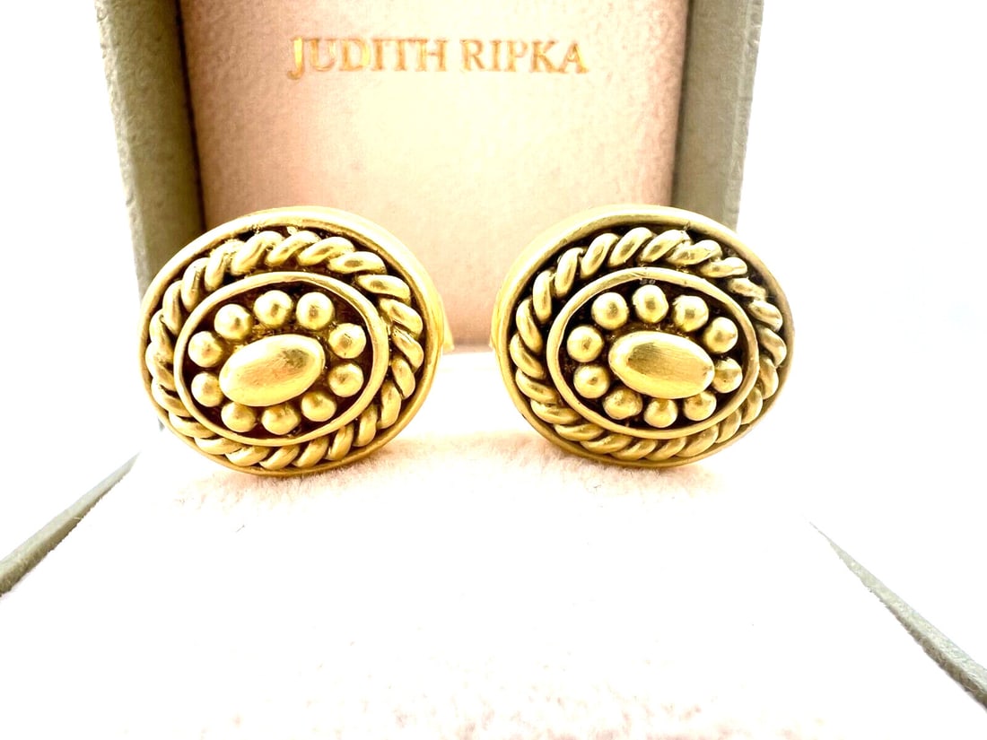 Judith Ripka 18K Yellow Gold Cufflinks with Box: Judith Ripka 18K Yellow Gold Cufflinks with Box Enhance your formal attire with this exquisite pair of cufflinks by Judith Ripka, crafted in luxurious 18K yellow gold. Each cufflink showcases intricat