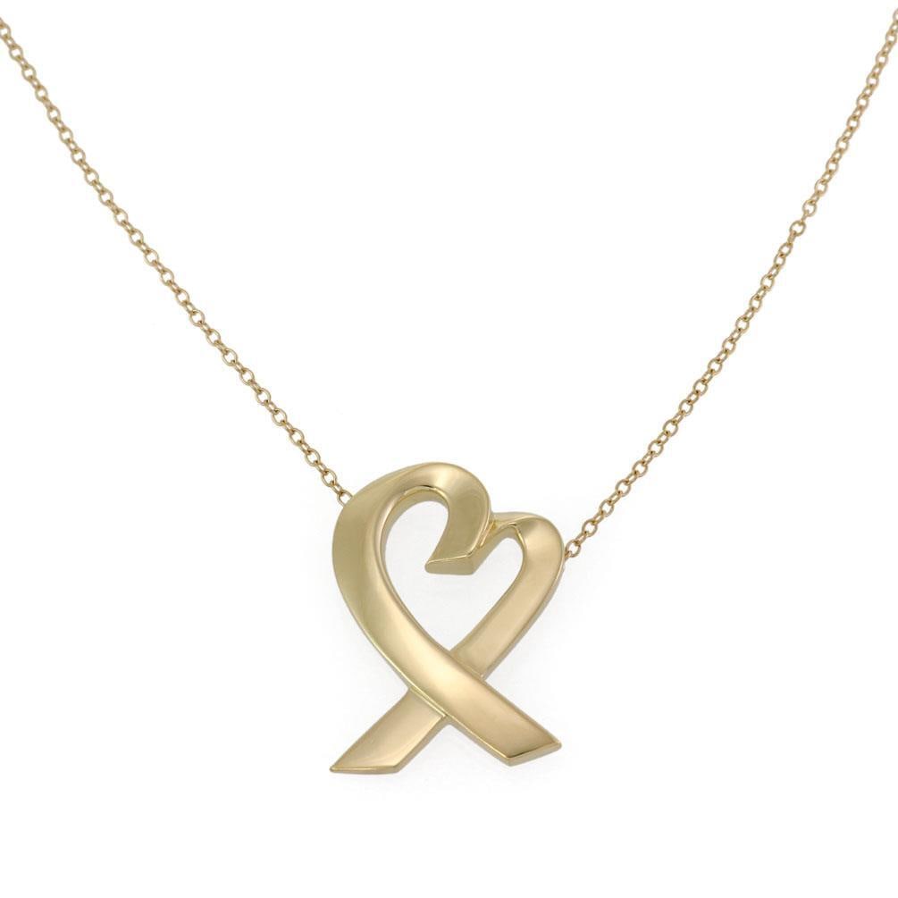 Tiffany & Co. Paloma Picasso 18k Yellow Gold Heart Pendant Necklace: Tiffany & Co. Paloma Picasso 18k Yellow Gold Heart Pendant Necklace This stunning large pendant and chain from Tiffany & Co. is designed by Paloma Picasso, showcasing the iconic Loving Heart collectio