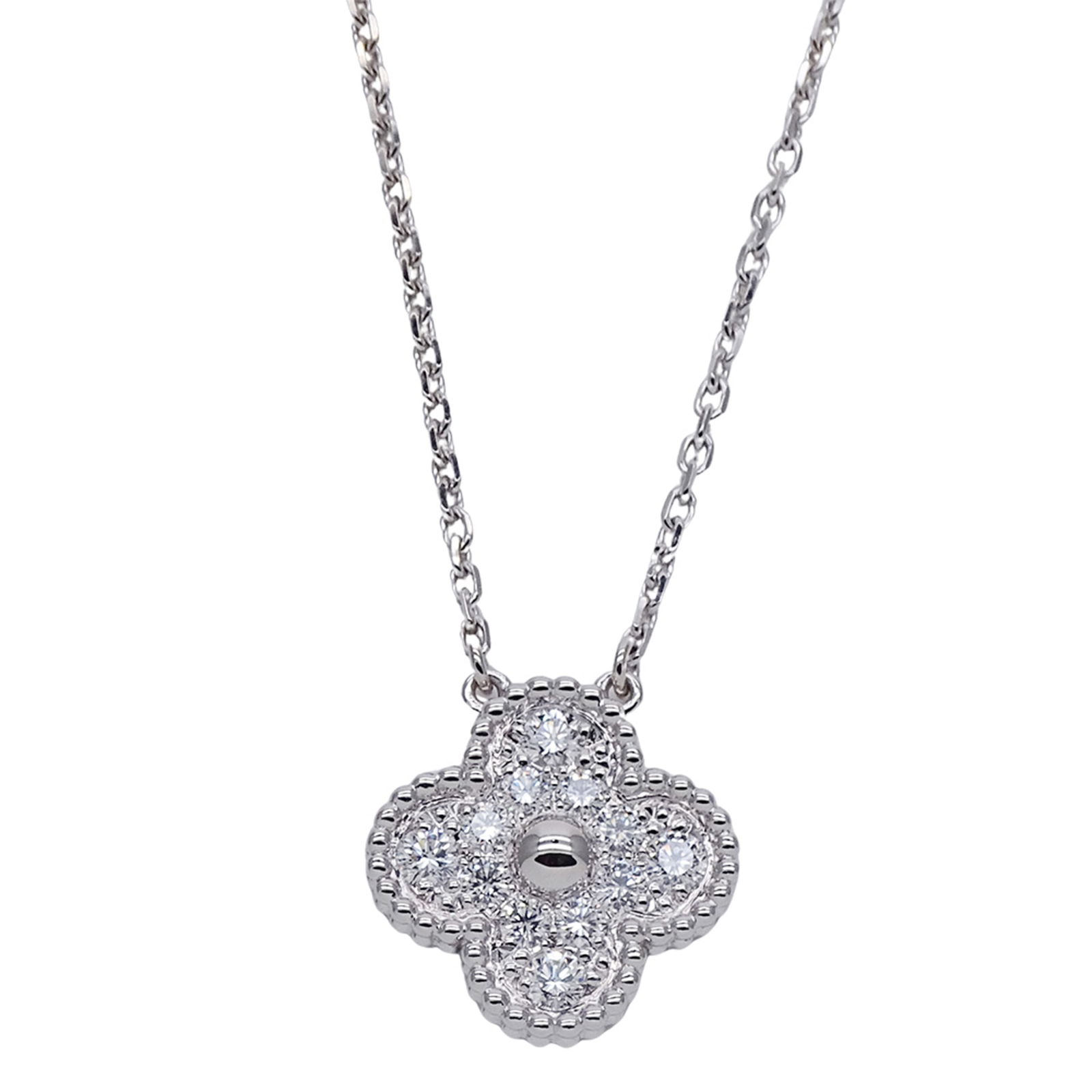 White Gold Vintage Alhambra Necklace by Van Cleef & Arpels: White Gold Vintage Alhambra Necklace by Van Cleef & Arpels This Van Cleef & Arpels Vintage Alhambra necklace features a delicate motif crafted in white gold with a silver tone. Designed for women, it